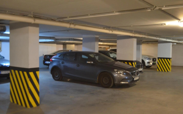 Flat at the edge of the center + parking