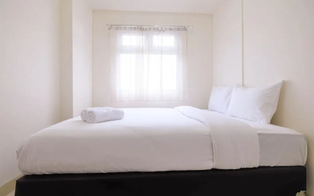 2 Bedrooms at Green Pramuka City Apartment By Travelio