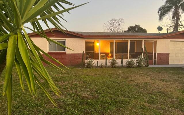 Private Tropical Waterfront Sanctuary with pool, hot tub & an island!