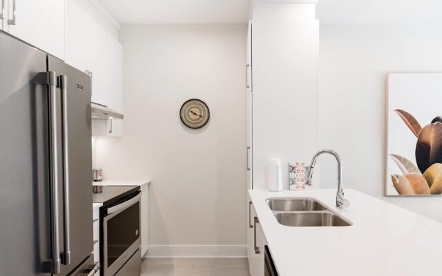 Discover Little Italy From a Bright Apartment