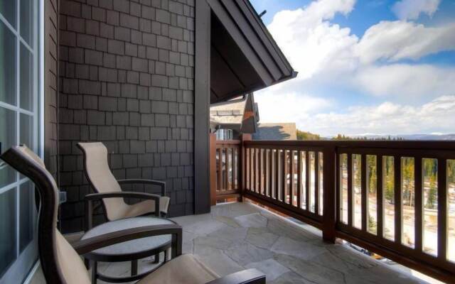 Expansive 4 Bedroom Ski in, Ski out One Ski Hill Residence Located at the Base of Peak 8 with Beautiful Views