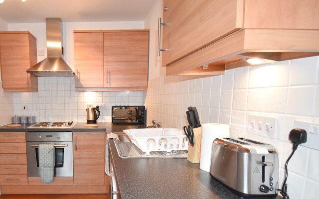 MK Hub Apartment with Oak Furniture