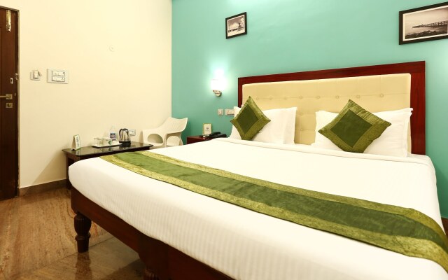 Treebo Grace Inn, 3 Min Walk From Promenade Beach