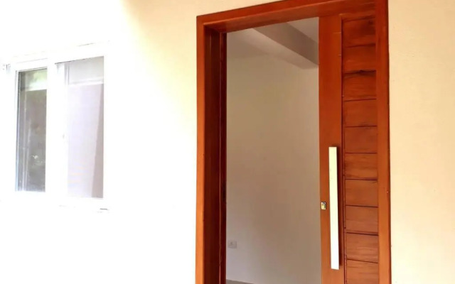 Casa com varanda, ar condicionado pet friendly