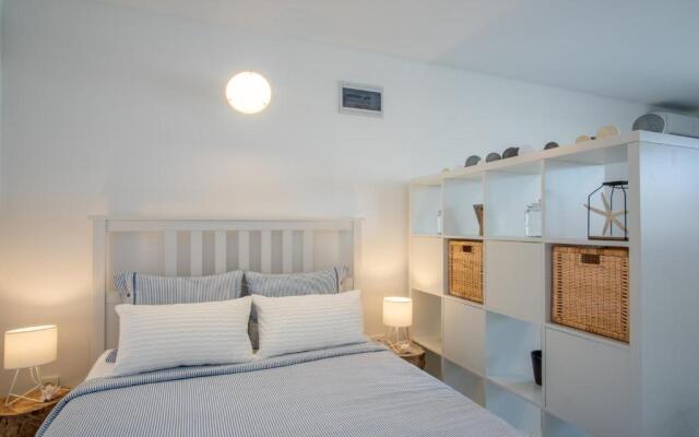 A White Cliffside Studio