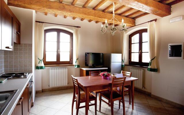 An agritourism complex with views of Assisi.