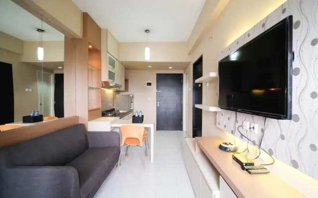 Homey And Tidy 2Br At Puri Mas Apartment