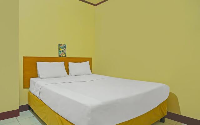 SPOT ON 92466 Adam Kost SyariahNearWisata Jembatan Barito