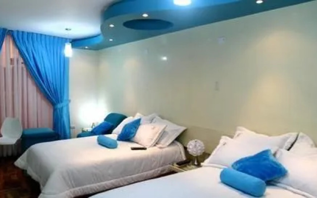 Taymi Hostal & Suites