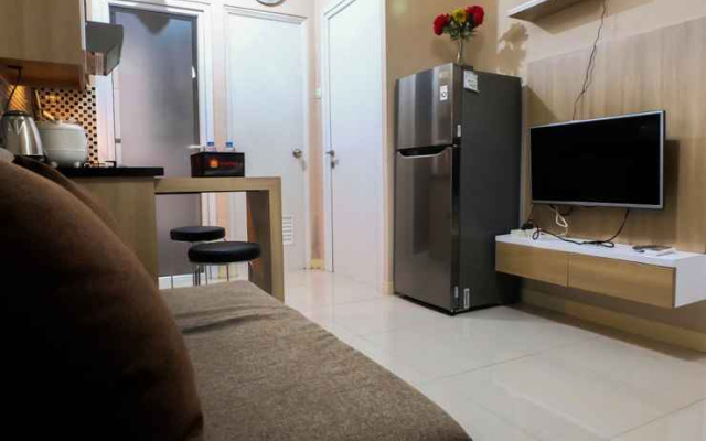 Cozy 2BR Green Pramuka Apartment By Travelio