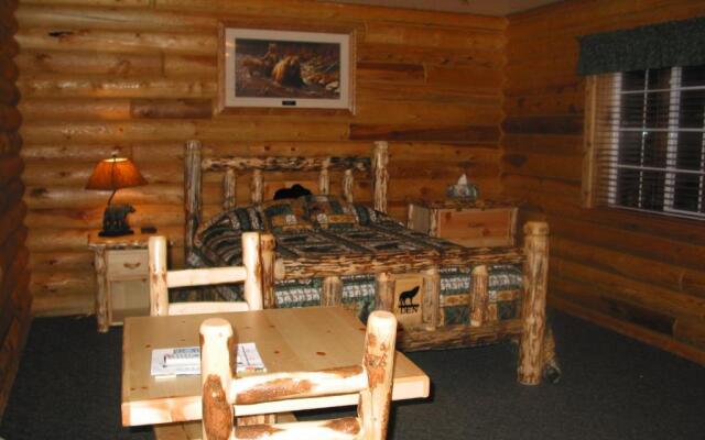 Wolf Den Log Cabin Motel and RV Park