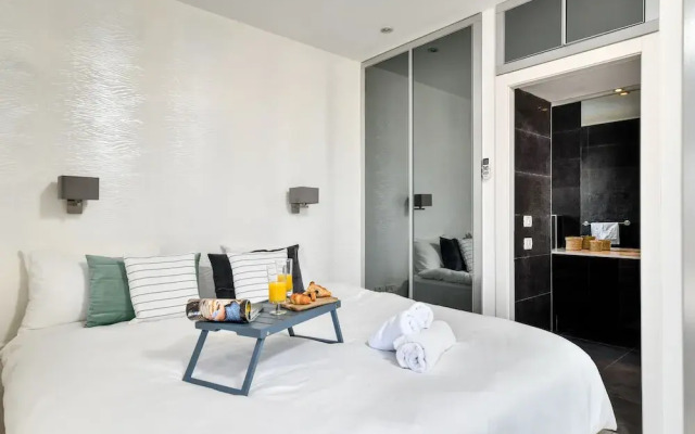 Modern Gem with Stunning Balcony by Sea N Rent
