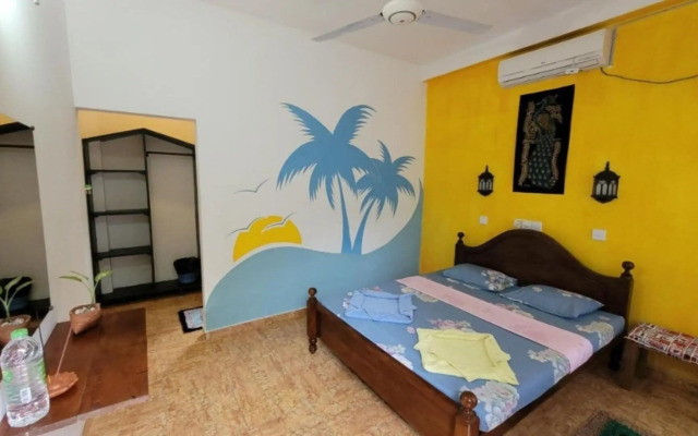 Malika's Yellow House