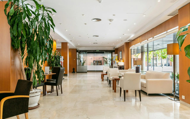 Отель Sercotel de los Reyes