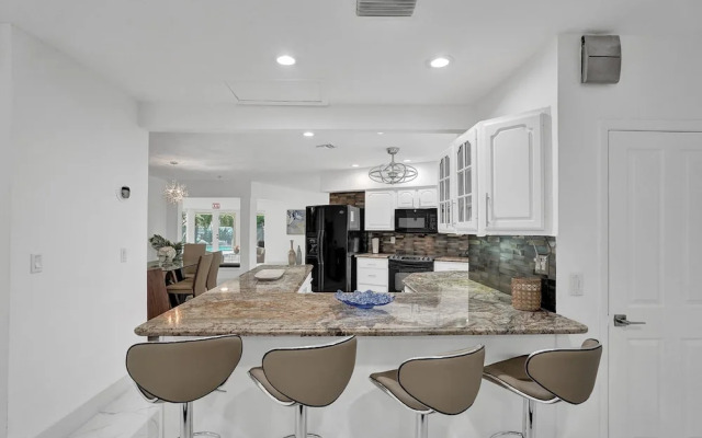 Waterfront 7BR Villa with Heated Pool