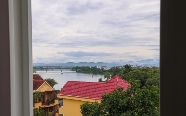 Purple Hue Charming Riverside Hotel