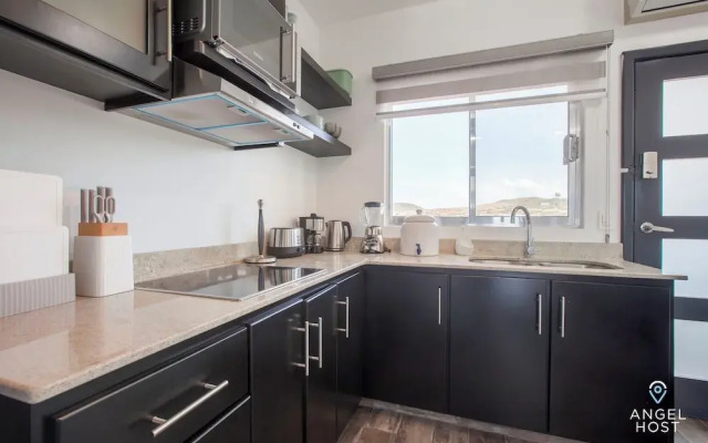 Condos Near Malecon Bay & Sunset Views