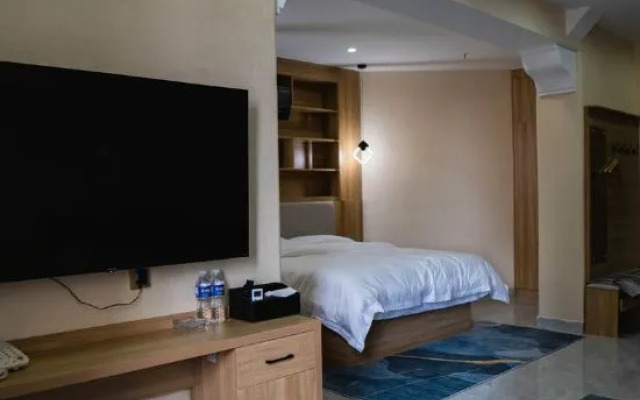 Grace Inn Qingju Hotel (Yanggu Wanhe City Branch)