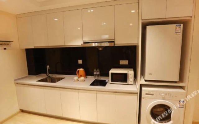 Qingdao Sihai Jiuzhou Hotel (Wuyue Plaza pengpaidao store)