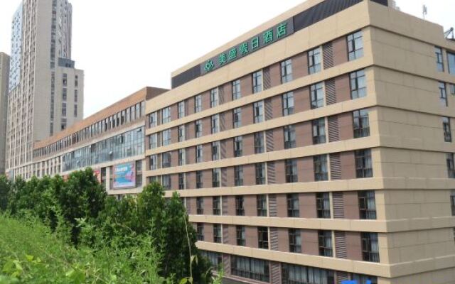 Shiyan Meisheng Holiday Hotel (Shanghai Road University Town)