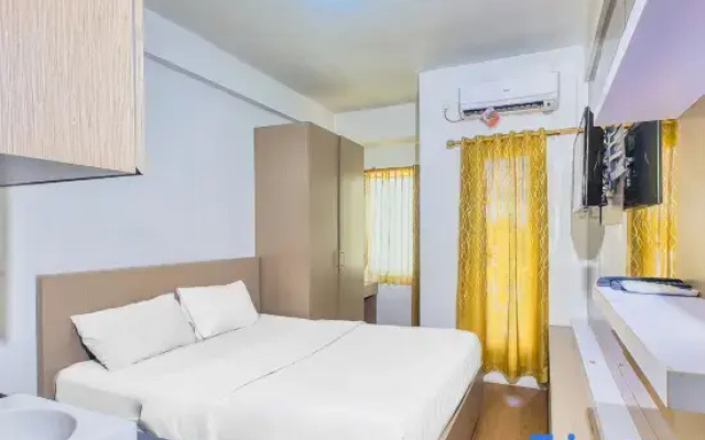 Quintessa Room at Candiland Apartement