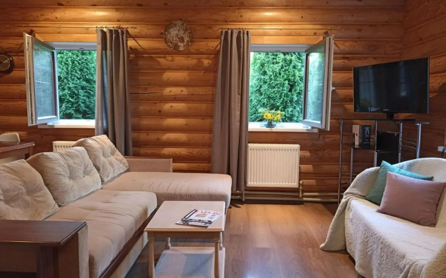 Log house with a Russian wood-burning sauna