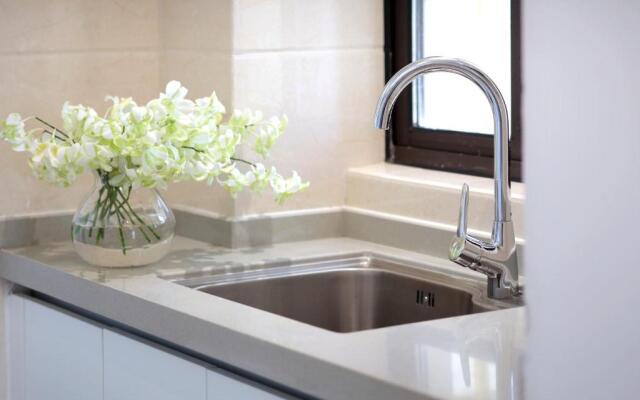 Green Collection Care Hotel (24 Hours Free Transfer from Meilan Airport/Railway Station)