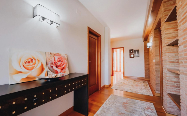 Villa con piscina a pie de playa