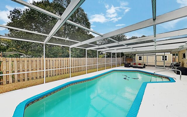 New Listing! Updated W/ Caged Pool & Patio 4 Bedroom Home