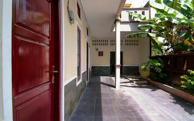 SPOT ON 92570 Putri Guest House Syariah Near SPBU Rimbo Panjang
