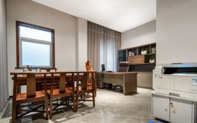 Xindi Hotel (Zhengzhou Zhongyuan Wanda Store Qinling Road Subway Station)