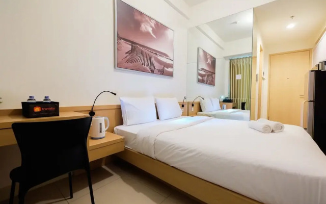Homey Studio Room Tree Park Apartment near BSD City By Travelio
