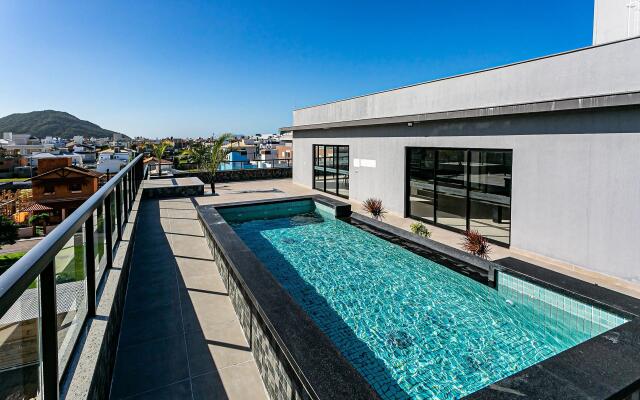 Studio em condomínio c/ piscina 700m praia STI210