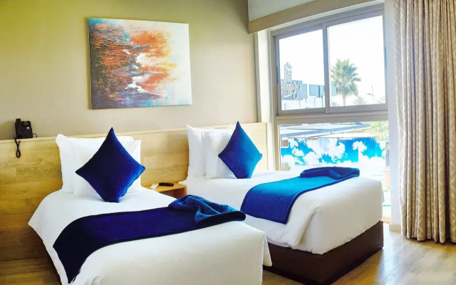 Mabrouk Hotel And Suites