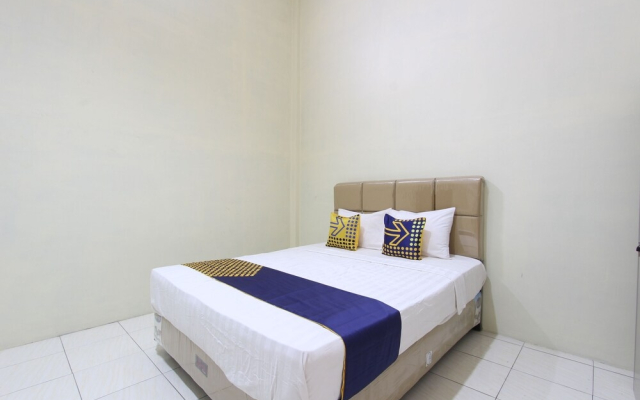 Spot On 93245 Guet House Mulia Dua Syariah