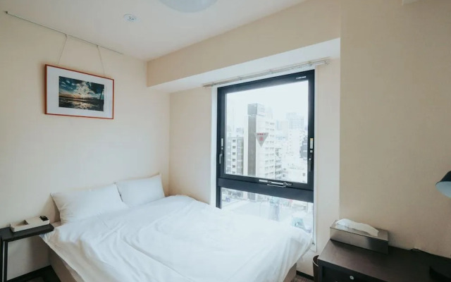 Отель Unito Shiodome