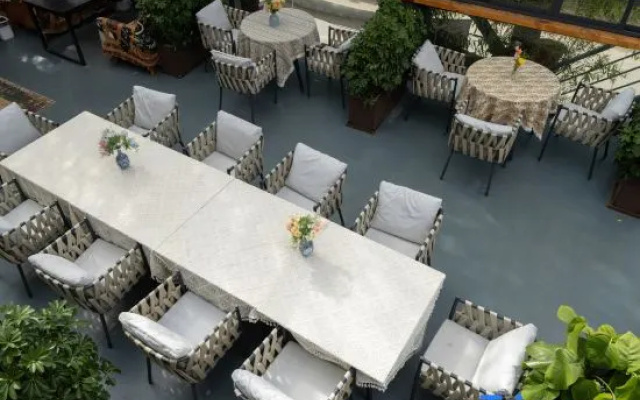 Moye Luxury Snow Mountain View Courtyard（Sunlight on Golden Mountains）Vacation Boutique Hotel – Restaurant – Lijiang