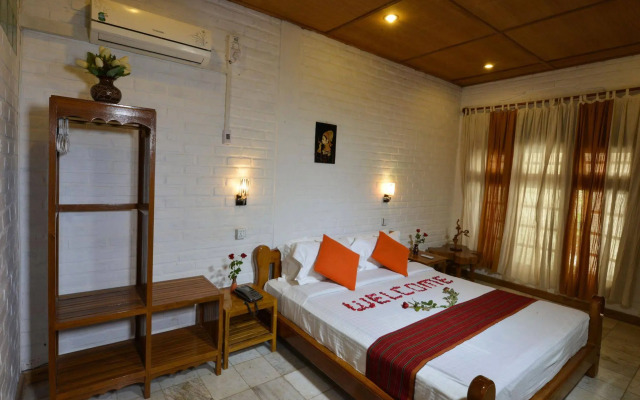 Teak Wood Hotel