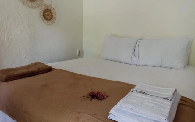 Canoa Hostel e Suites