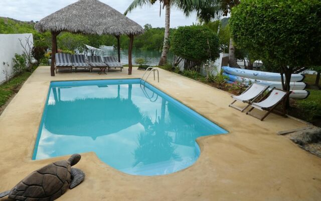 Bungalow With 2 Bedrooms in Andilana, With Wonderful sea View, Shared Pool and Enclosed Garden