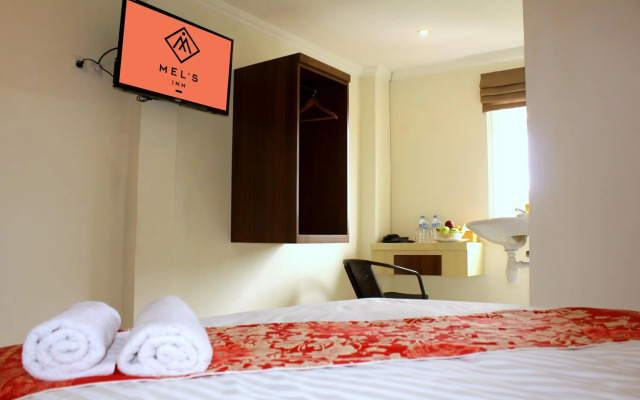 Airy Mapanget AA Maramis Manado