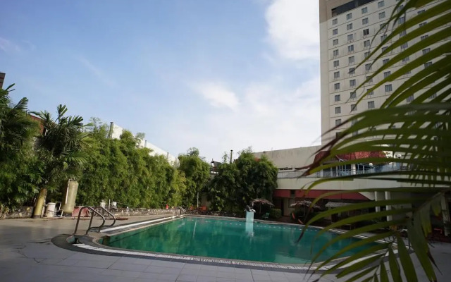 Capital O 1963 Hotel The New Benakutai