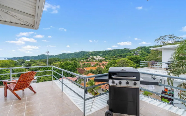 Modern Top-Floor Condo with Panoramic Views and Community Pool