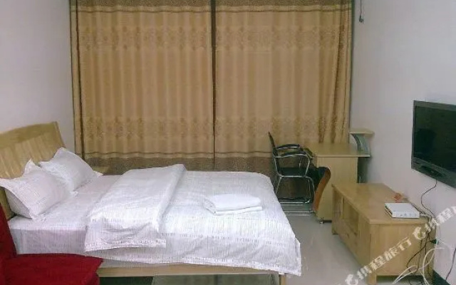 她他酒店式公寓(玉林市中医院凯旋世纪广场店)