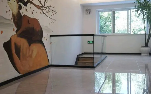 Sanmen Jinsenberland Business Hotel