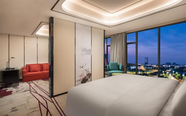 Ramada by Wyndham Mengzi Suites