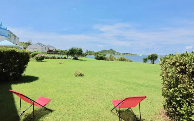 Le Baileys - Spacieux appartement en rez-de-jardin vue lagon
