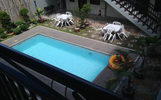 Poleng Suites Hotel