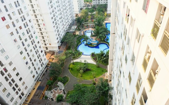 Monochrome Style 2 Bedrooms at Kalibata City Apartment By Travelio