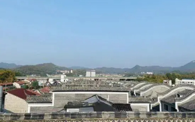 New Beacon Yunman Internation Hotel (Yingshan Tourist Center Chaxiang Small Town)